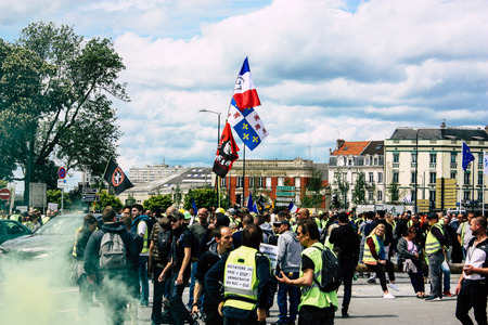 Reims France May 18, 2019 View of unknown Yellow Jackets protesters marching against the policy of...