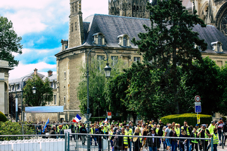Reims France May 18, 2019 View of unknown Yellow Jackets protesters marching against the policy of President Macron on Saturday afternoonのeditorial素材