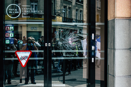 Reims France May 18, 2019 View of broken windows by rioters in the streets of Reims during protests of the Yellow Jackets on saturday afternoonのeditorial素材