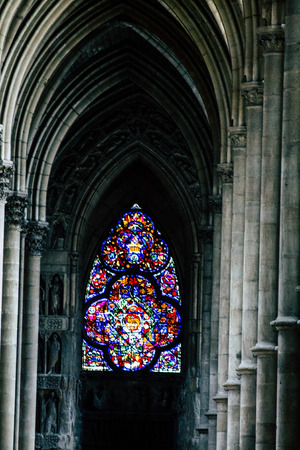 Reims France May 23, 2019 View of the old colorful stained glass windows in Notre Dame de Reims Cathedral in the afternoonのeditorial素材