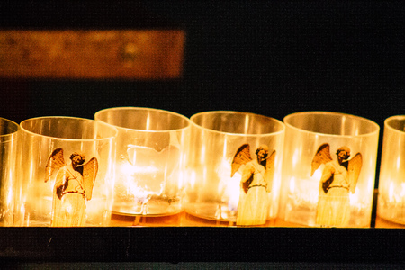 Reims France May 23, 2019 Closeup of holy candles inside of Notre Dame Cathedral of Reims in the afternoonのeditorial素材