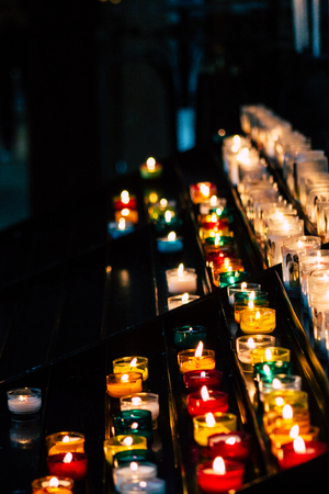 Reims France May 23, 2019 Closeup of holy candles inside of Notre Dame Cathedral of Reims in the afternoonのeditorial素材
