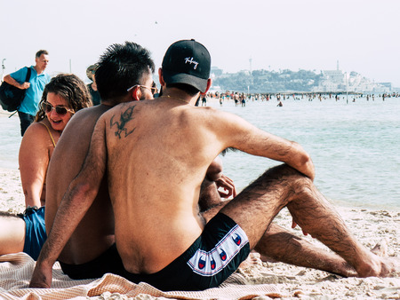 Tel Aviv Israel May 23, 2019 View of unknown Israeli people having fun on the beach of Tel Aviv in the afternoonのeditorial素材