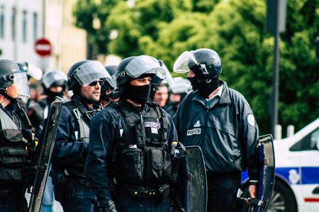 Reims France May 18, 2019 View of the rioters and policemen fighting face to face in the streets of Reims during protests of the Yellow Jackets in the streets of Reims on saturday afternoonのeditorial素材