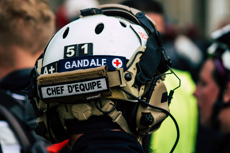 Reims France May 18, 2019 View of French medic walking in the street during protests of the Yellow jackets against the policy of President Macron in Reims on saturday afternoonのeditorial素材