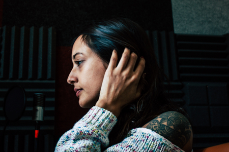 Papendrecht Netherlands April 18, 2019 Portrait of Reachel Singh, Dutch professional songwriter recording the new single, Fly with me, in studio in Netherlandsのeditorial素材