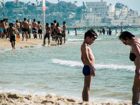 Tel Aviv Israel May 31, 2019 View of unknown Israeli people having fun on the beach of Tel Aviv in the afternoonのeditorial素材