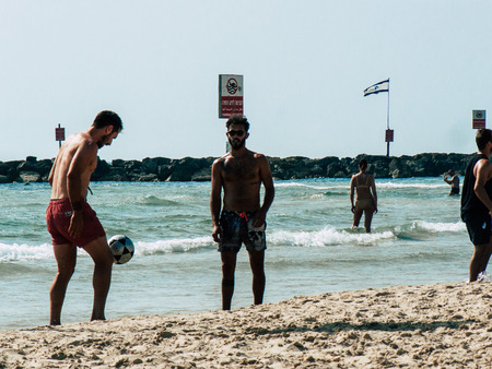 Tel Aviv Israel May 31, 2019 View of unknown Israeli people having fun on the beach of Tel Aviv in the afternoonのeditorial素材
