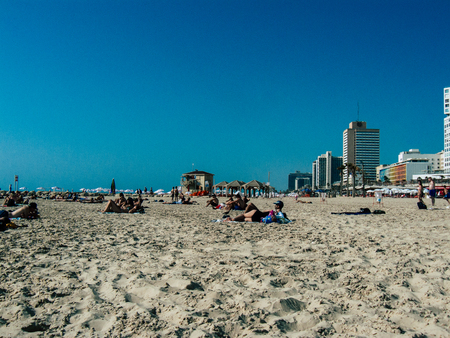 Tel Aviv Israel May 31, 2019 View of unknown Israeli people having fun on the beach of Tel Aviv in the afternoonのeditorial素材