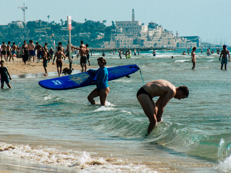 Tel Aviv Israel May 31, 2019 View of unknown Israeli people having fun on the beach of Tel Aviv in the afternoonのeditorial素材
