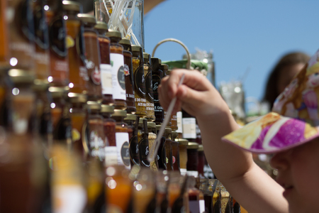 Reims France Saturday June 1, 2019 Closeup of jars of jam sold during the Johanniques festival, annual French celebration in Reims to commemorate the coronation of Charles VIIのeditorial素材