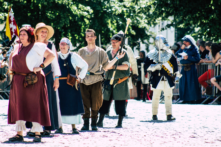Reims France Saturday June 2, 2019 View of people disguised as medieval character unfolding in the streets during the Johanniques feast, annual French celebration in Reimsのeditorial素材