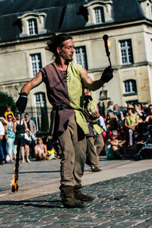 Reims France Saturday June 1, 2019 View of unknown street performers doing a show during the Johanniques festival, annual French celebration in Reims to commemorate the coronation of Charles VIIのeditorial素材