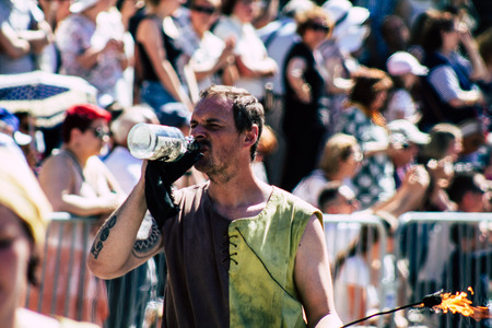 Reims France June 2, 2019 View of people disguised as medieval character unfolding in the streets during the Johanniques feast, annual French celebration in Reimsのeditorial素材