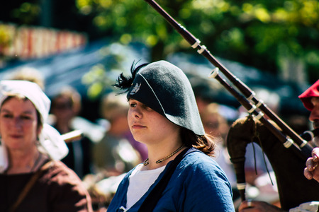 Reims France Saturday June 2, 2019 View of people disguised as medieval character unfolding in the streets during the Johanniques feast, annual French celebration in Reimsのeditorial素材