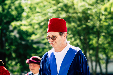 Reims France June 2, 2019 View of people disguised as medieval character unfolding in the streets during the Johanniques feast, annual French celebration in Reimsのeditorial素材