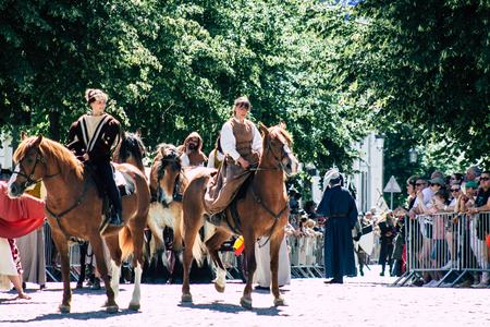 Reims France Saturday June 2, 2019 View of people disguised as medieval character unfolding in the streets during the Johanniques feast, annual French celebration in Reimsのeditorial素材