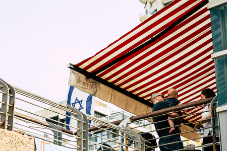 Tel Aviv Israel June 10, 2019 View of the Israeli flag in the streets of Tel Aviv in the afternoonのeditorial素材