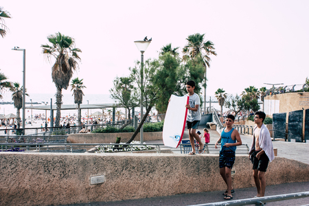 Tel Aviv Israel June 10, 2019 View of unknown Israeli people walking in the streets of Tel Aviv in the afternoonのeditorial素材
