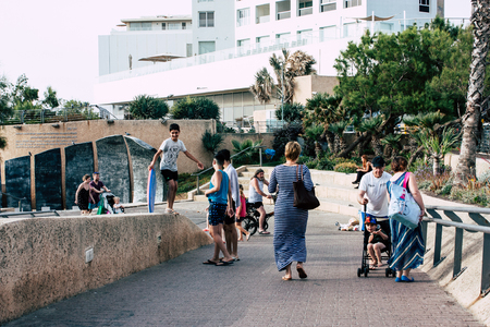 Tel Aviv Israel June 10, 2019 View of unknown Israeli people walking in the streets of Tel Aviv in the afternoonのeditorial素材