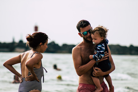 Tel Aviv Israel June 8, 2019 View of unknown Israeli children having fun on the beach of Tel Aviv in the afternoonのeditorial素材