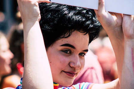 Tel Aviv Israel June 14, 2019 Portrait of unknown Israeli people participating to the gay pride parade in the streets of Tel Aviv in the afternoonのeditorial素材