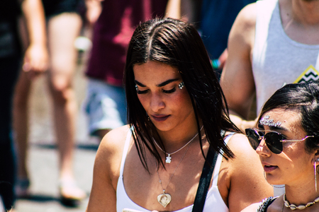 Tel Aviv Israel June 14, 2019 Portrait of unknown Israeli people participating to the gay pride parade in the streets of Tel Aviv in the afternoonのeditorial素材