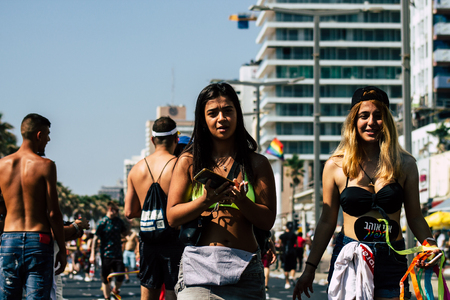 Tel Aviv Israel June 14, 2019 View of unknown Israeli people participating to the gay pride parade in the streets of Tel Aviv in the afternoonのeditorial素材