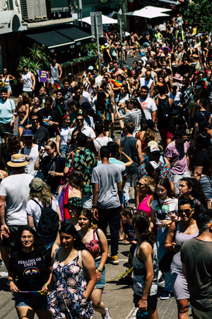 Tel Aviv Israel June 14, 2019 View of unknown Israeli people participating to the gay pride parade in the streets of Tel Aviv in the afternoonのeditorial素材