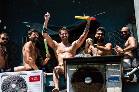 Tel Aviv Israel June 14, 2019 View of unknown Israeli people watching the gay pride parade of Tel Aviv from the balcony in the afternoonのeditorial素材