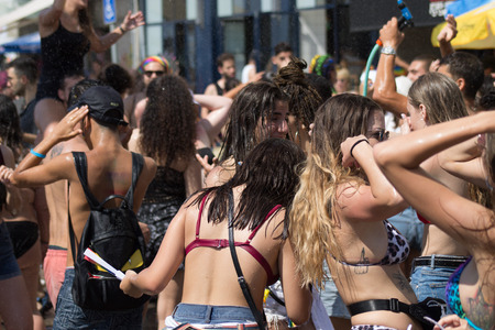 Tel Aviv Israel June 14, 2019 View of unknown Israeli people dancing at the gay pride parade in the streets of Tel Aviv in the afternoonのeditorial素材