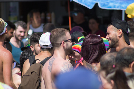 Tel Aviv Israel June 14, 2019 View of unknown Israeli people dancing at the gay pride parade in the streets of Tel Aviv in the afternoonのeditorial素材