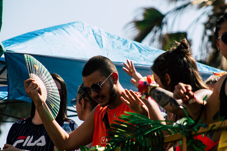 Tel Aviv Israel June 14, 2019 View of unknown Israeli people watching the gay pride parade of Tel Aviv from the balcony in the afternoonのeditorial素材