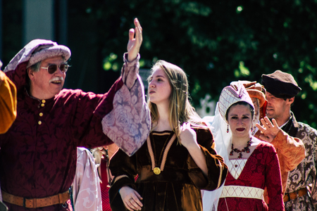 Reims France June 2, 2019 View of people disguised as medieval character unfolding in the streets during the Johanniques feast, annual French celebration in Reimsのeditorial素材