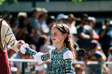 Reims France June 2, 2019 View of people disguised as medieval character unfolding in the streets during the Johanniques feast, annual French celebration in Reimsのeditorial素材