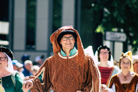 Reims France June 2, 2019 View of people disguised as medieval character unfolding in the streets during the Johanniques feast, annual French celebration in Reimsのeditorial素材