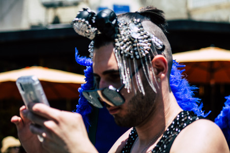 Tel Aviv Israel June 14, 2019 Portrait of unknown Israeli people participating to the gay pride parade in the streets of Tel Aviv in the afternoonのeditorial素材