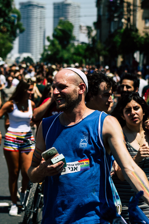 Tel Aviv Israel June 14, 2019 Portrait of unknown Israeli people participating to the gay pride parade in the streets of Tel Aviv in the afternoonのeditorial素材