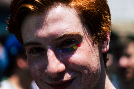 Tel Aviv Israel June 14, 2019 Portrait of unknown Israeli people participating to the gay pride parade in the streets of Tel Aviv in the afternoonのeditorial素材