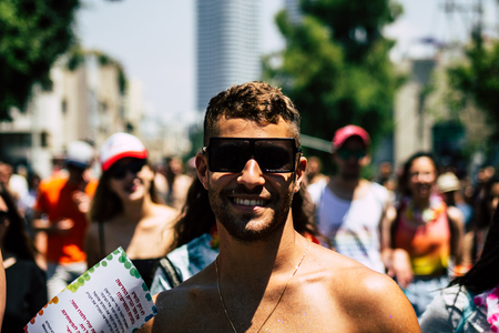 Tel Aviv Israel June 14, 2019 Portrait of unknown Israeli people participating to the gay pride parade in the streets of Tel Aviv in the afternoonのeditorial素材