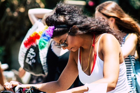 Tel Aviv Israel June 14, 2019 Portrait of unknown Israeli people participating to the gay pride parade in the streets of Tel Aviv in the afternoonのeditorial素材