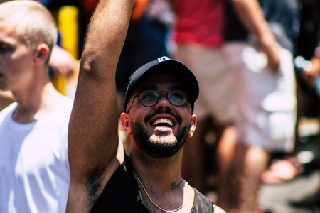 Tel Aviv Israel June 14, 2019 Portrait of unknown Israeli people participating to the gay pride parade in the streets of Tel Aviv in the afternoonのeditorial素材