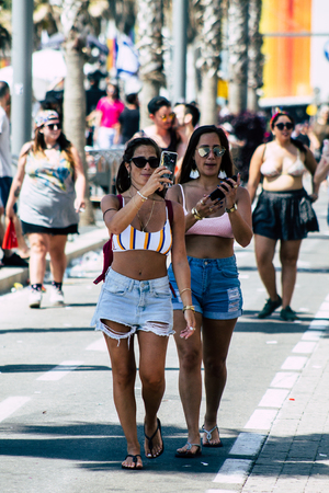 Tel Aviv Israel June 14, 2019 View of unknown Israeli people participating to the gay pride parade in the streets of Tel Aviv in the afternoonのeditorial素材