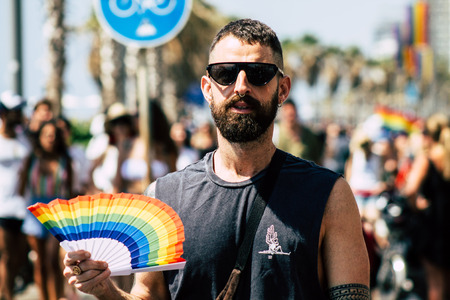 Tel Aviv Israel June 14, 2019 Portrait of unknown Israeli people participating to the gay pride parade in the streets of Tel Aviv in the afternoonのeditorial素材