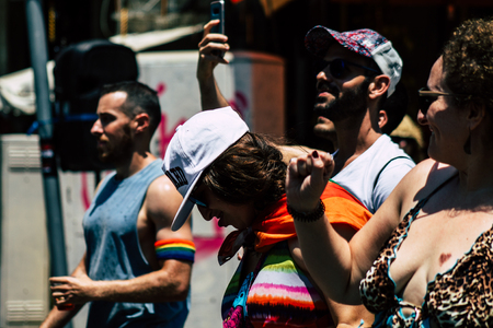 Tel Aviv Israel June 14, 2019 View of unknown Israeli people participating to the gay pride parade in the streets of Tel Aviv in the afternoonのeditorial素材