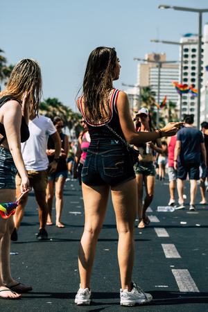 Tel Aviv Israel June 14, 2019 View of unknown Israeli people participating to the gay pride parade in the streets of Tel Aviv in the afternoonのeditorial素材