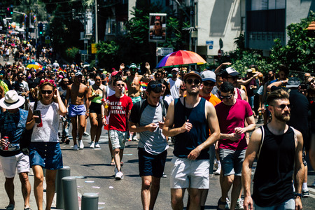 Tel Aviv Israel June 14, 2019 View of unknown Israeli people participating to the gay pride parade in the streets of Tel Aviv in the afternoonのeditorial素材