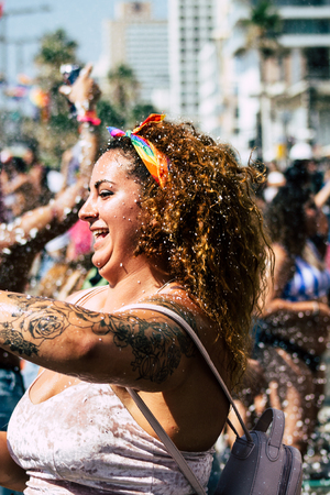 Tel Aviv Israel June 14, 2019 Portrait of unknown Israeli people participating to the gay pride parade in the streets of Tel Aviv in the afternoonのeditorial素材
