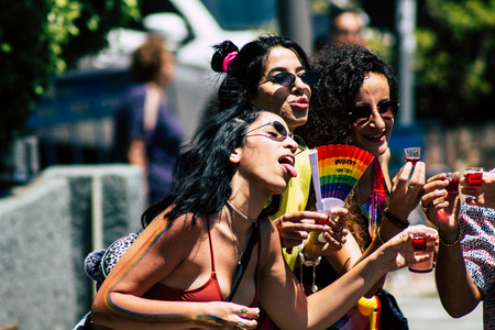 Tel Aviv Israel June 14, 2019 View of unknown Israeli people participating to the gay pride parade in the streets of Tel Aviv in the afternoonのeditorial素材