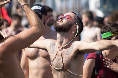Tel Aviv Israel June 14, 2019 View of unknown Israeli people dancing at the gay pride parade in the streets of Tel Aviv in the afternoonのeditorial素材